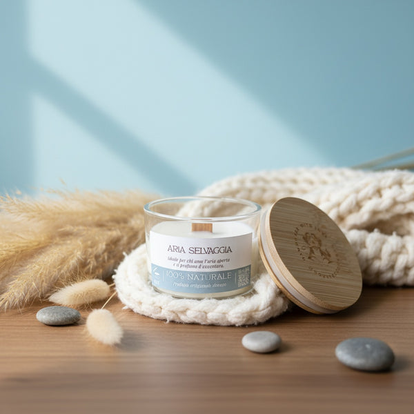Candle jar with lid on a woven mat with natural elements on a wooden surface