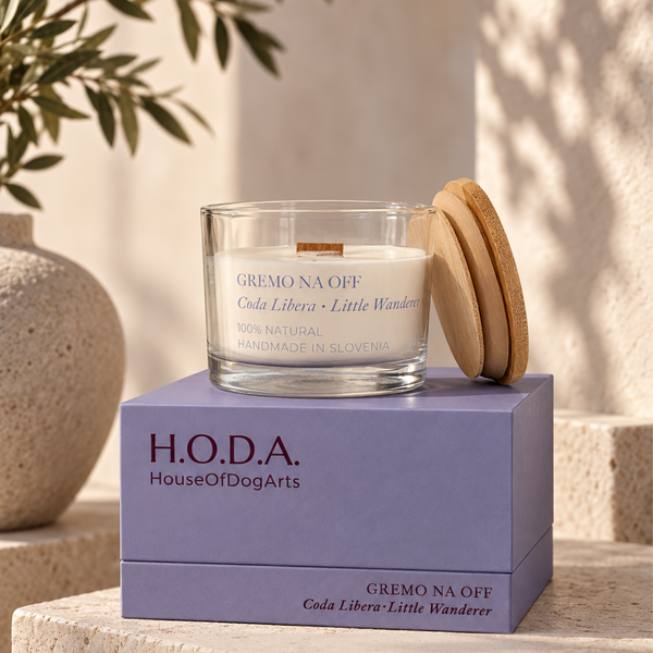 H.O.D.A. Indoor Atmosphere Collection showing four handmade scented candles with new colour-coded packaging in blush, terracotta, sage and lavender, styled on warm travertine stone with bamboo lids and wooden wicks.