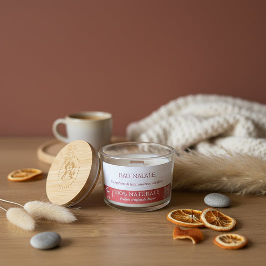 Candle and soap with a cup of coffee on a wooden surface